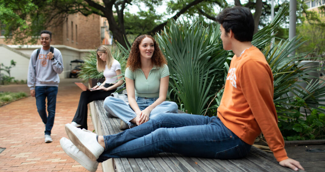 Photo of two students on campus.